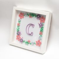 Obrazek – wianek z literą „C”